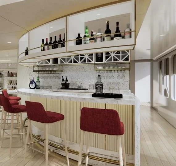 The salon bar with burgundy stools and shelves of bottles