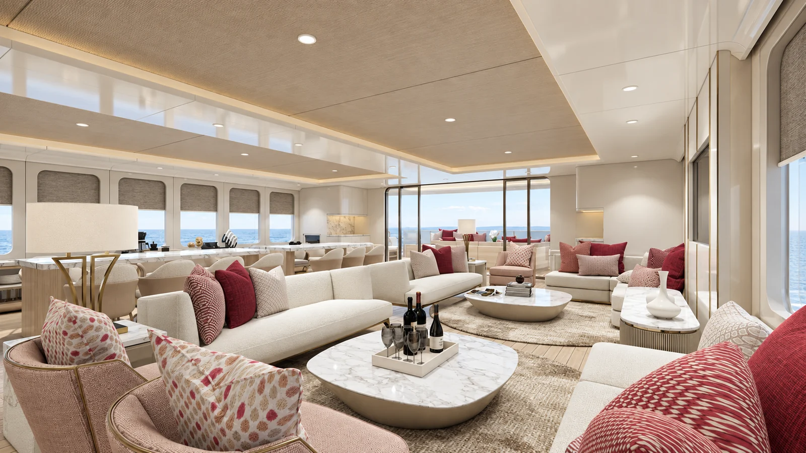 The main salon: cream sofas with burgundy cushions around marble tables
