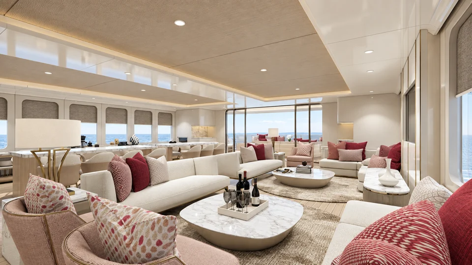 The main salon with cream sofas and burgundy cushions